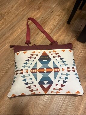 Pendleton Multicolor Aztec Shoulder Bag with Burgundy Strap unfolds to blanket